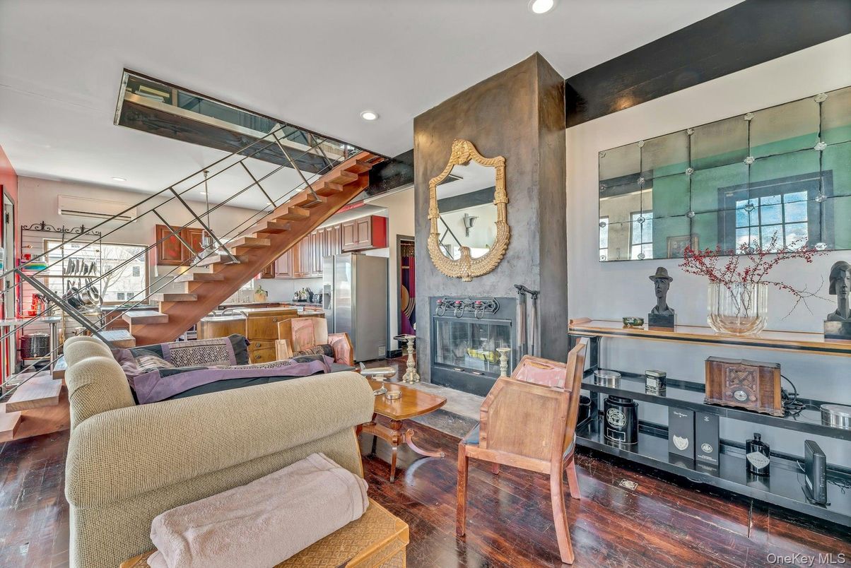 Dining room, Fireplace, Interior, Living room, Recessed Lighting, Wood Texture Flooring