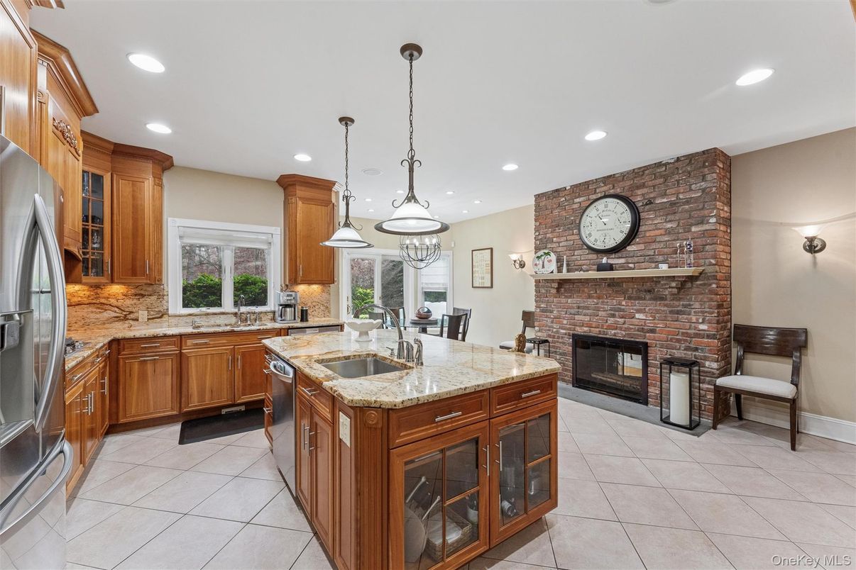 Dining room, Fireplace, Interior, Kitchen, Pendant Lights, Recessed Lighting, Stainless Steel Appliances, Stone Walls