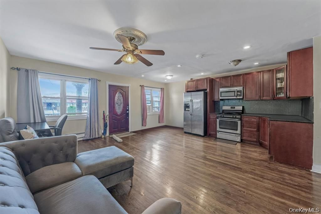 Dining room, Interior, Kitchen, Living room, Recessed Lighting, Stainless Steel Appliances, Wood Texture Flooring