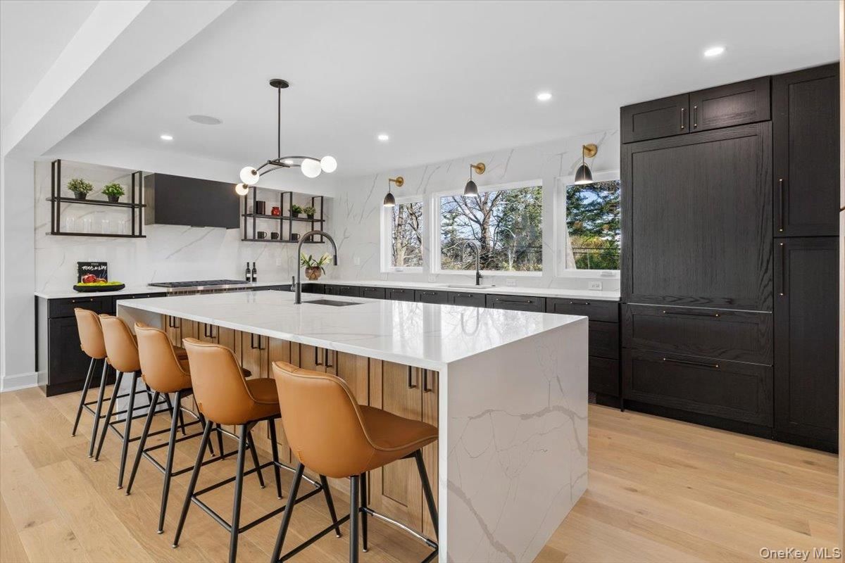 Interior, Kitchen, Marble Walls, Pendant Lights, Recessed Lighting, Wood Texture Flooring