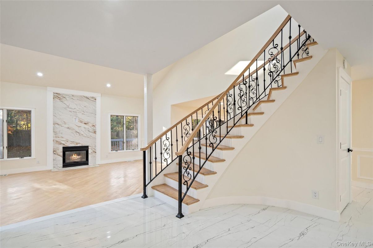 Fireplace, Interior, Marble, Recessed Lighting, Wood Texture Flooring