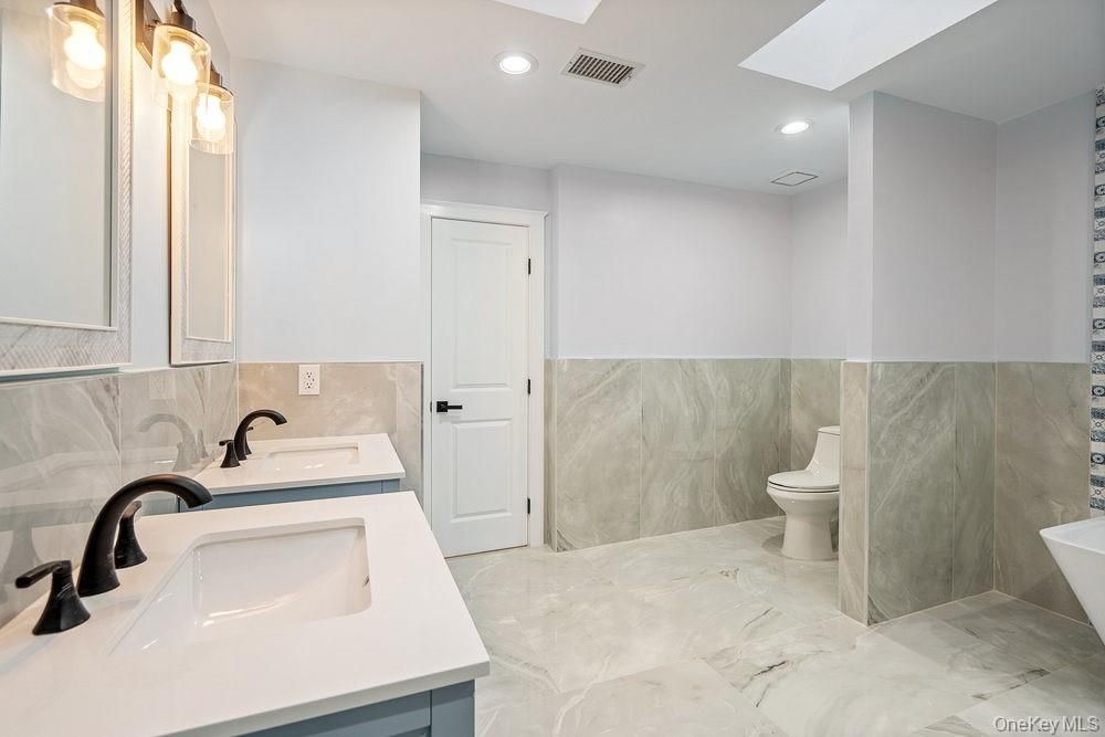 Bathroom, Dual Sink Vanities, Interior, Marble, Recessed Lighting