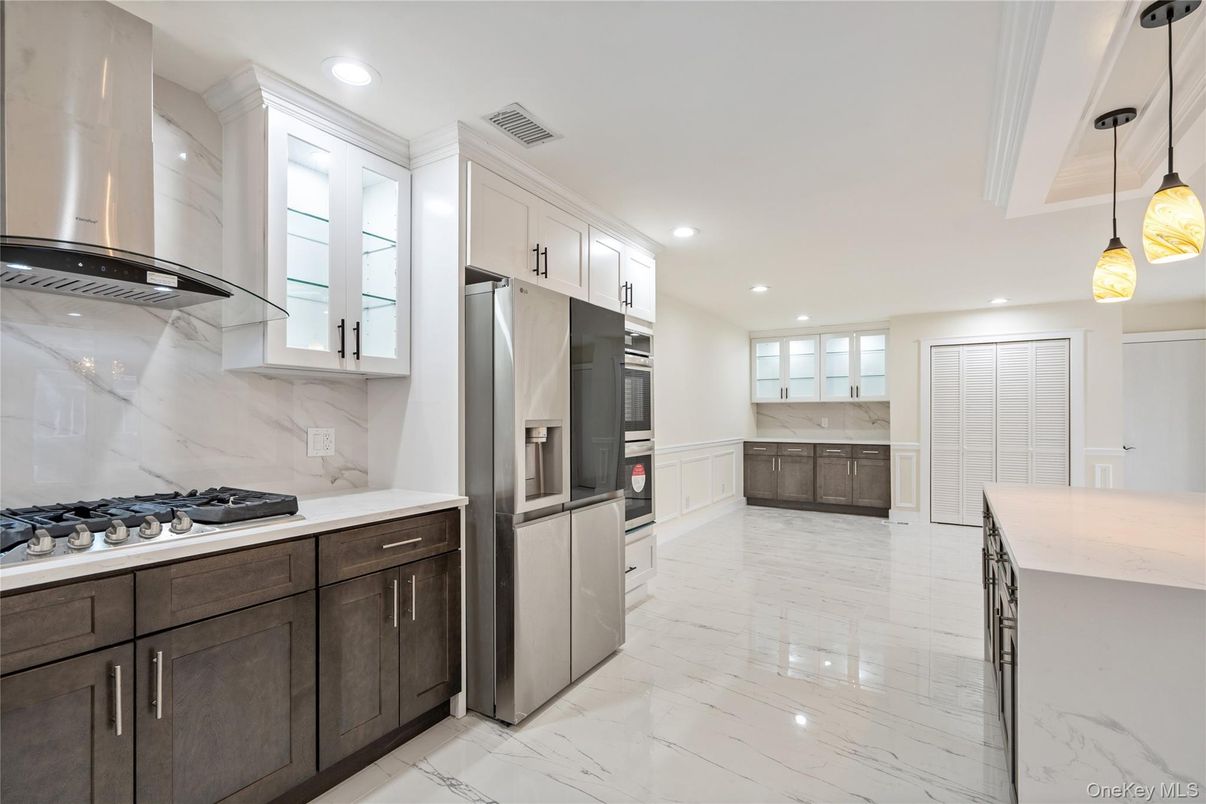 Interior, Kitchen, Marble, Marble Walls, Pendant Lights, Recessed Lighting, Stainless Steel Appliances