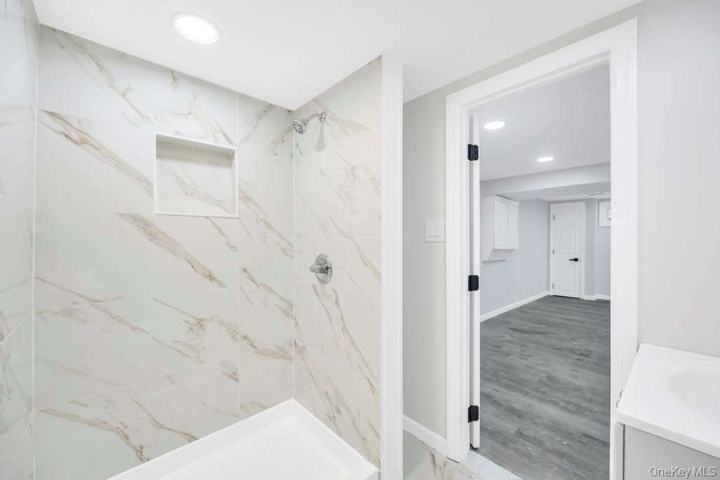 Bathroom, Interior, Marble Walls, Recessed Lighting, Wood Texture Flooring