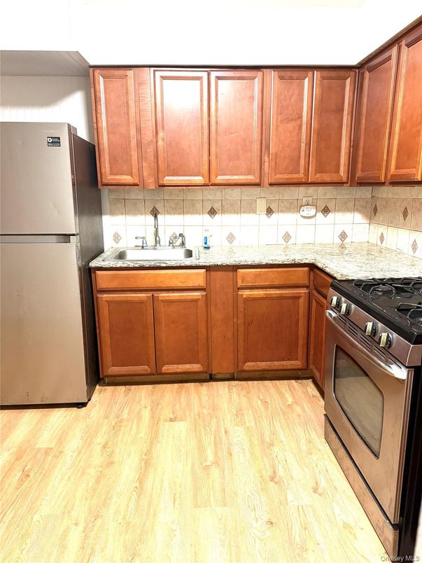 Interior, Kitchen, Tile Countertops, Wood Texture Flooring