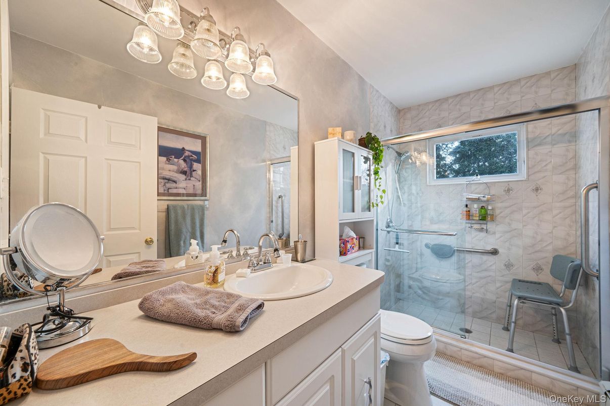 Bathroom, Dual Sink Vanities, Glass Shower, Interior, Marble Walls