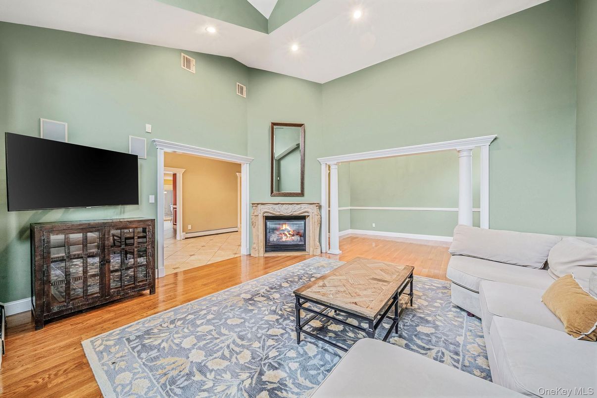 Fireplace, Interior, Living room, Recessed Lighting, Wood Texture Flooring