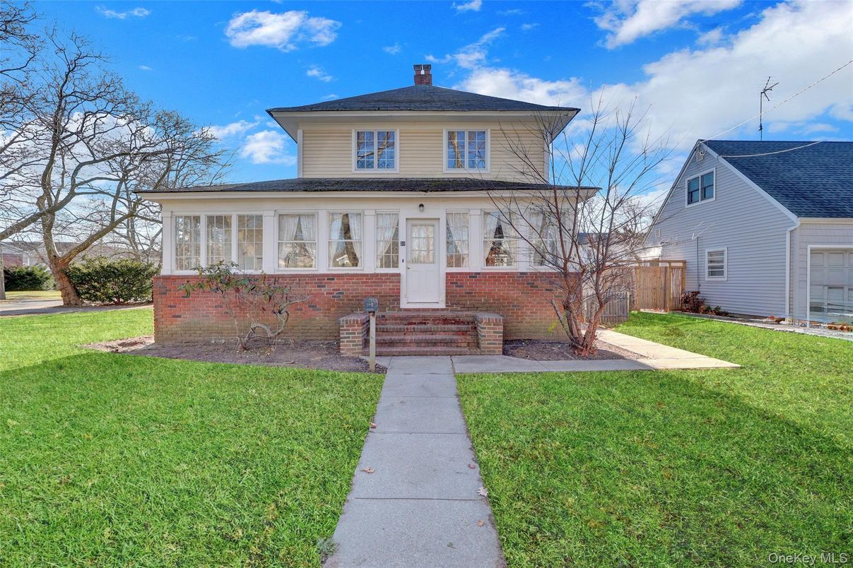 Exterior, Facade, Brick Facade, American Foursquare