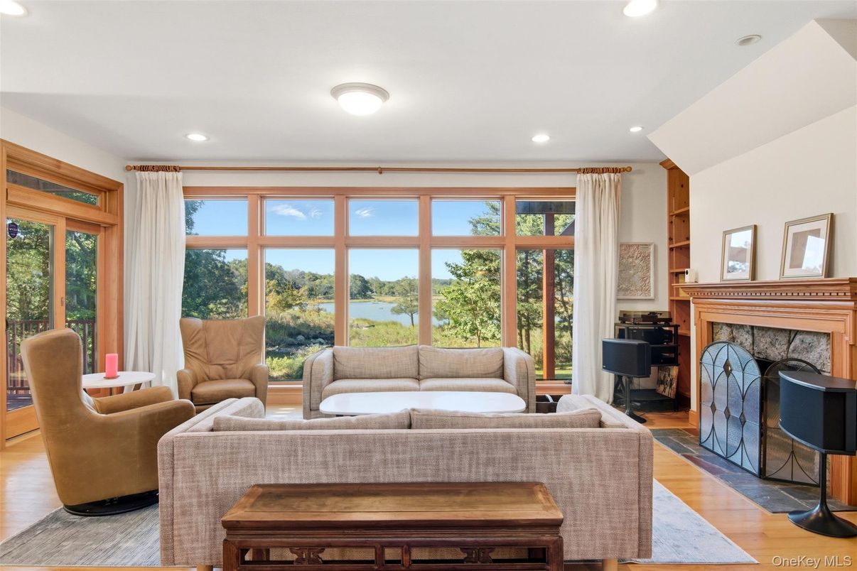 Fireplace, Interior, Living room, Recessed Lighting, Water, Wood Texture Flooring