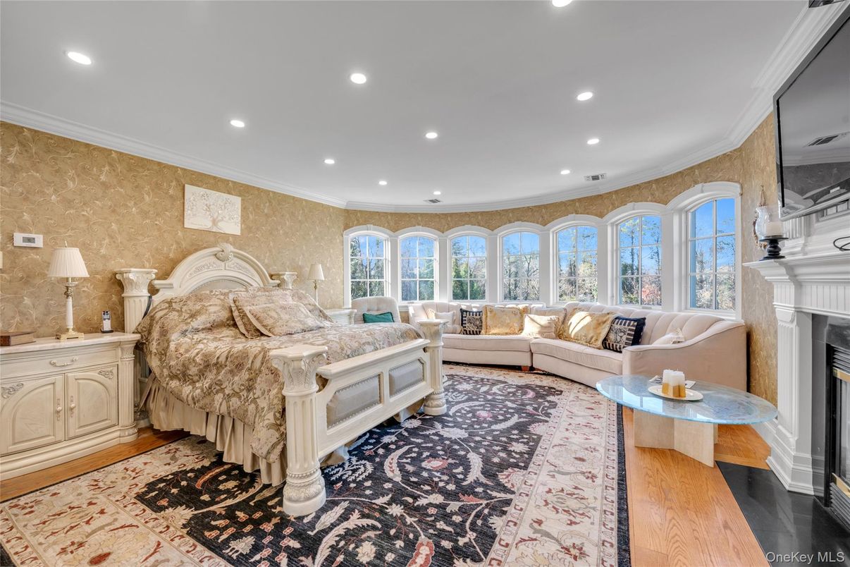 Bedroom, Fireplace, Interior, Living room, Recessed Lighting, Wood Texture Flooring