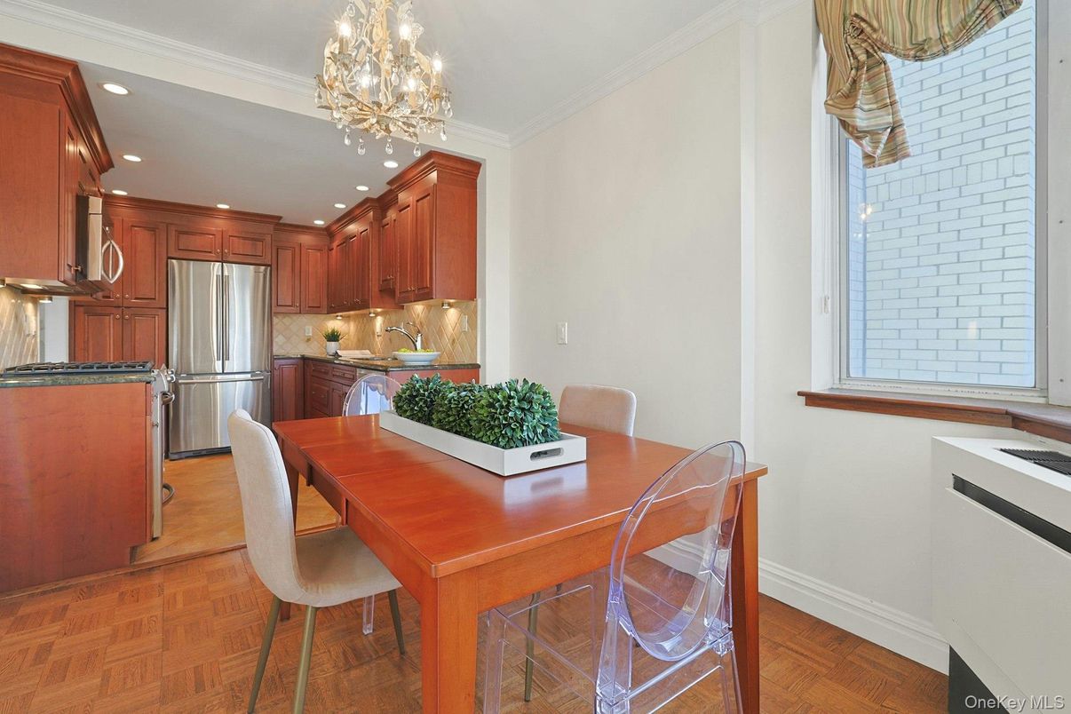 Chandelier, Dining room, Interior, Kitchen, Recessed Lighting, Stainless Steel Appliances, Wood Texture Flooring