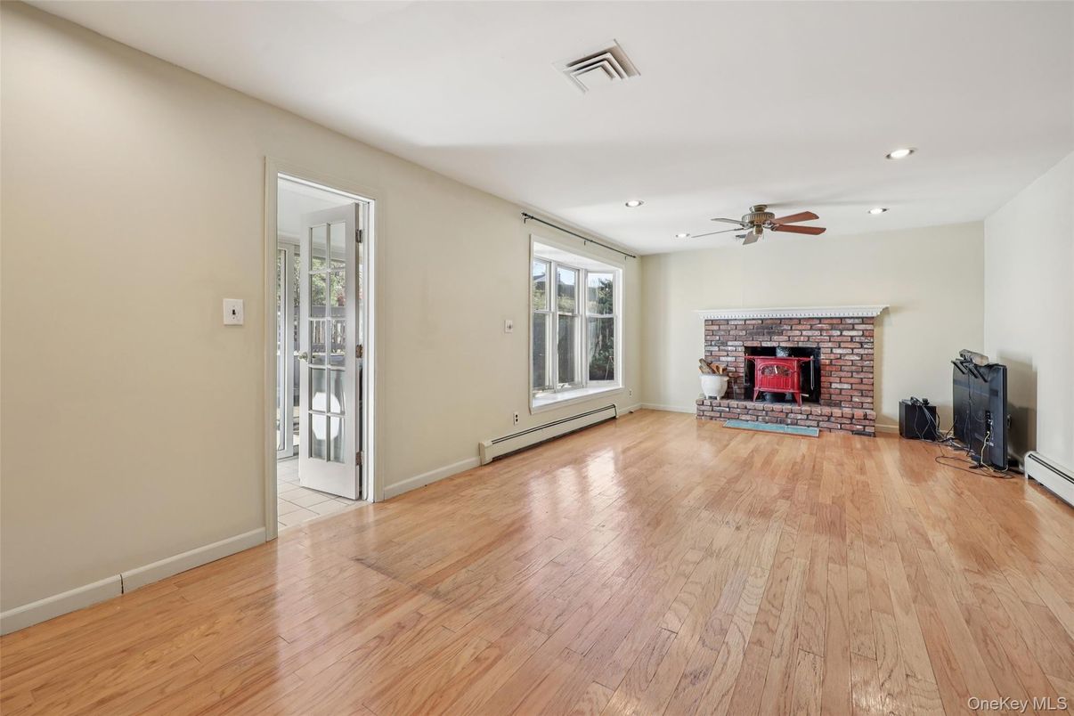 Empty room, Fireplace, Interior, Recessed Lighting, Wood Texture Flooring
