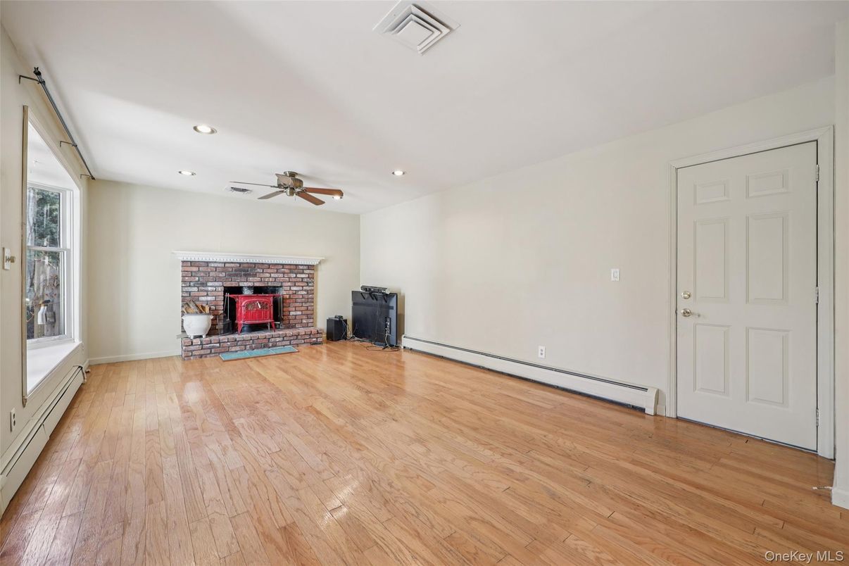 Empty room, Fireplace, Interior, Recessed Lighting, Wood Texture Flooring