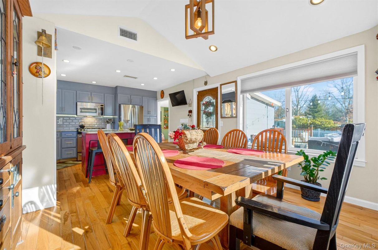 Dining room, Interior, Kitchen, Recessed Lighting, Stainless Steel Appliances, Wood Texture Flooring