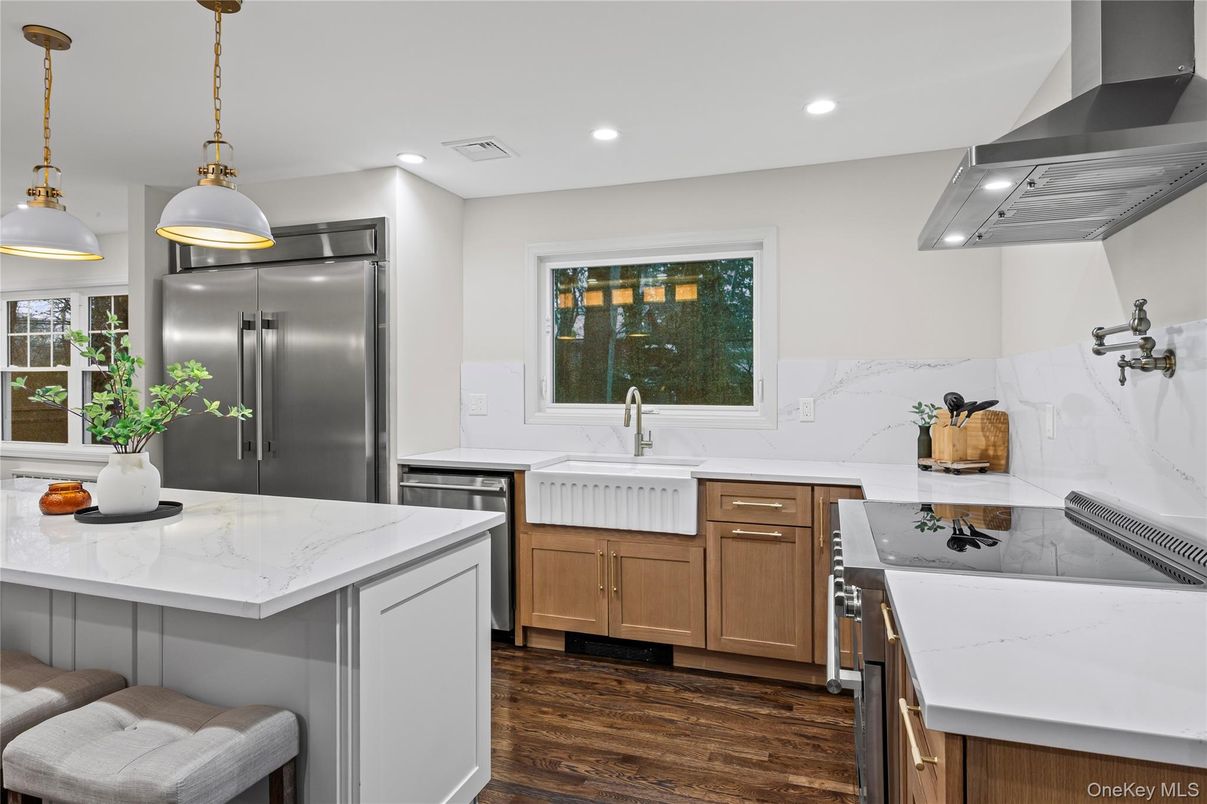 Interior, Kitchen, Marble Walls, Pendant Lights, Recessed Lighting, Stainless Steel Appliances, Wood Texture Flooring