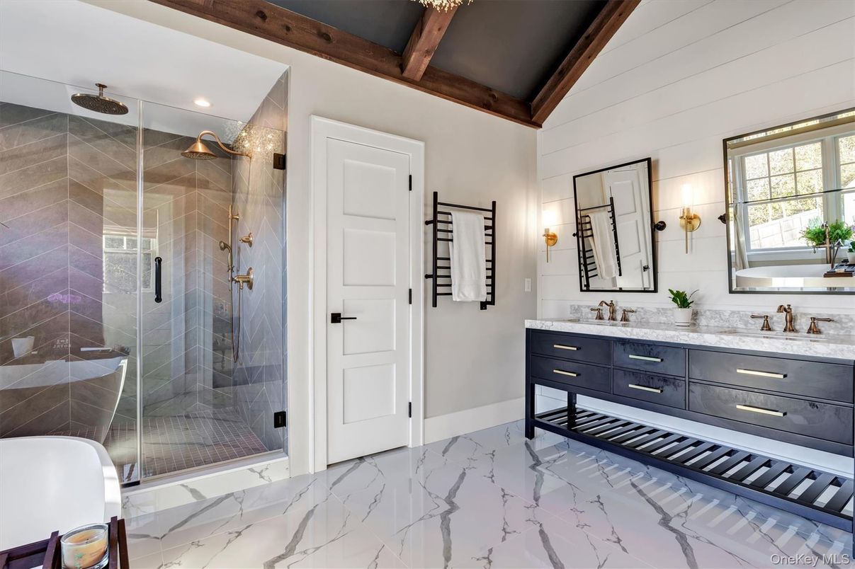 Bathroom, Dual Sink Vanities, Glass Shower, Interior, Marble, Recessed Lighting, Wooden Beams