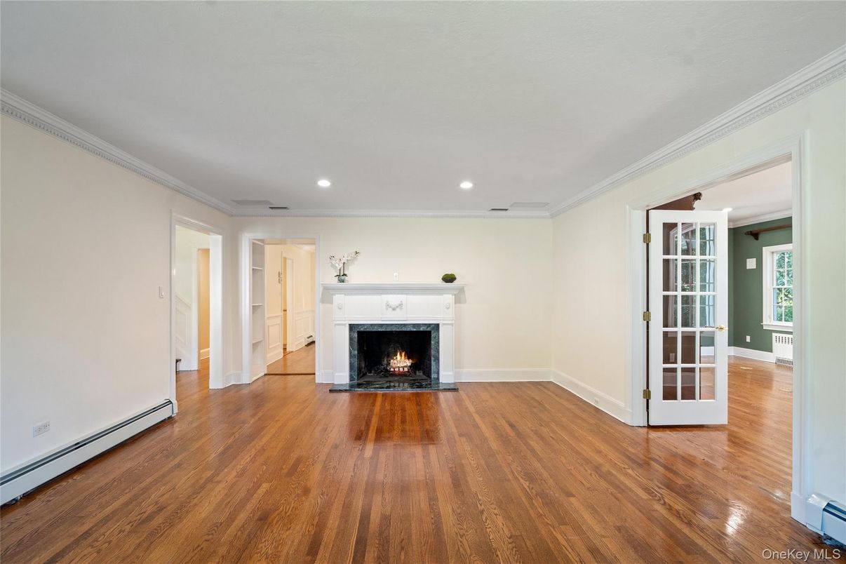 Empty room, Fireplace, Interior, Recessed Lighting, Wood Texture Flooring