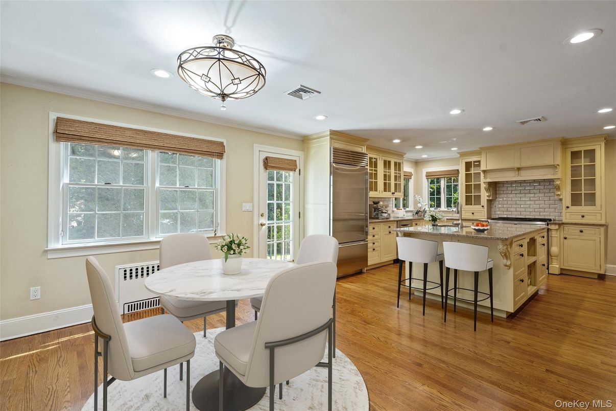 Dining room, Interior, Kitchen, Recessed Lighting, Stainless Steel Appliances, Wood Texture Flooring