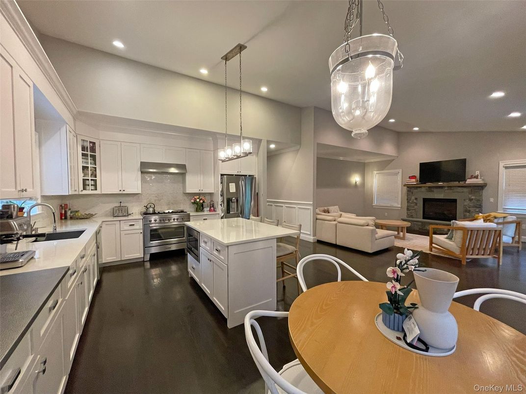 Dining room, Fireplace, Interior, Kitchen, Living room, Pendant Lights, Recessed Lighting, Stainless Steel Appliances