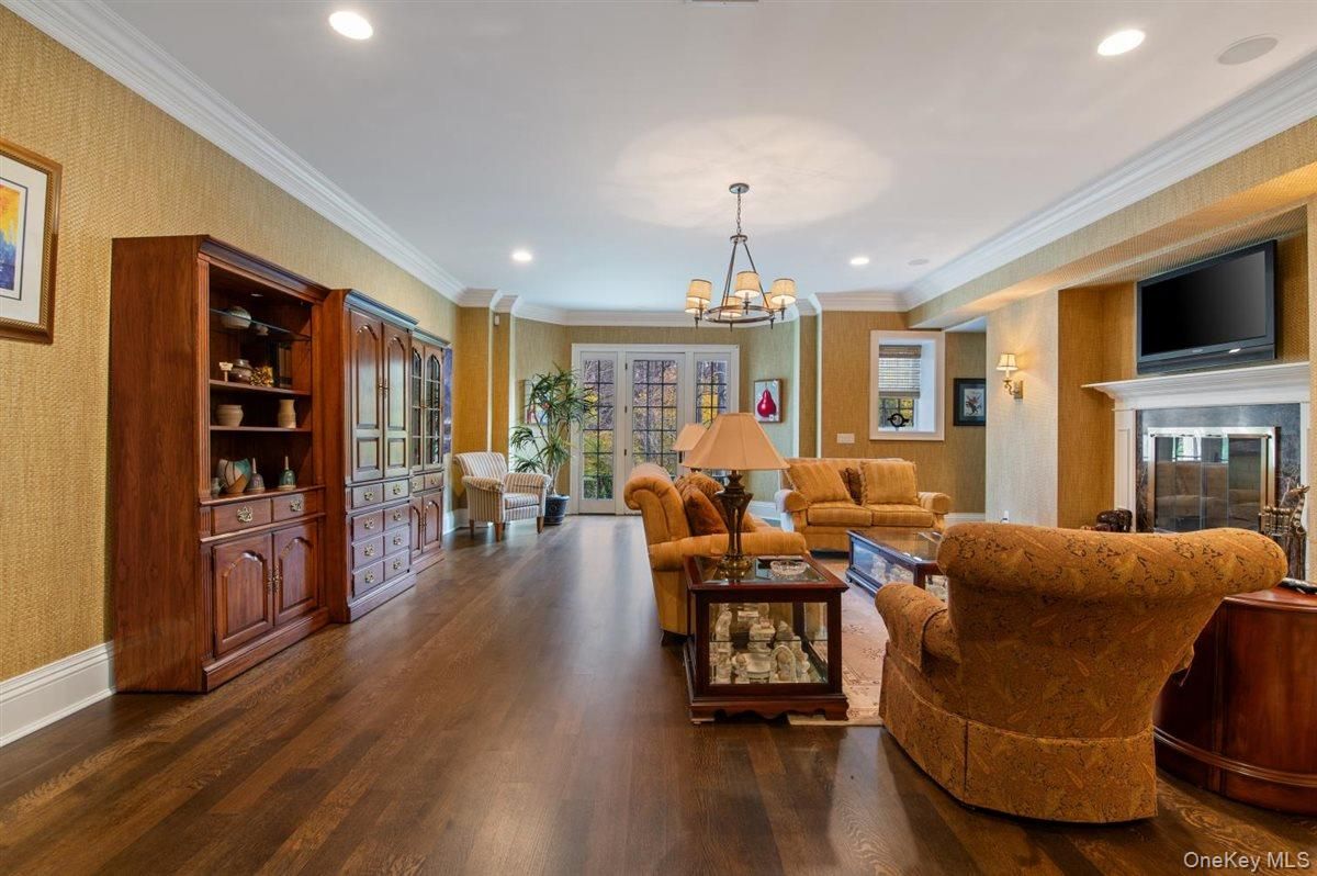 Chandelier, Fireplace, Interior, Living room, Recessed Lighting, Wood Texture Flooring