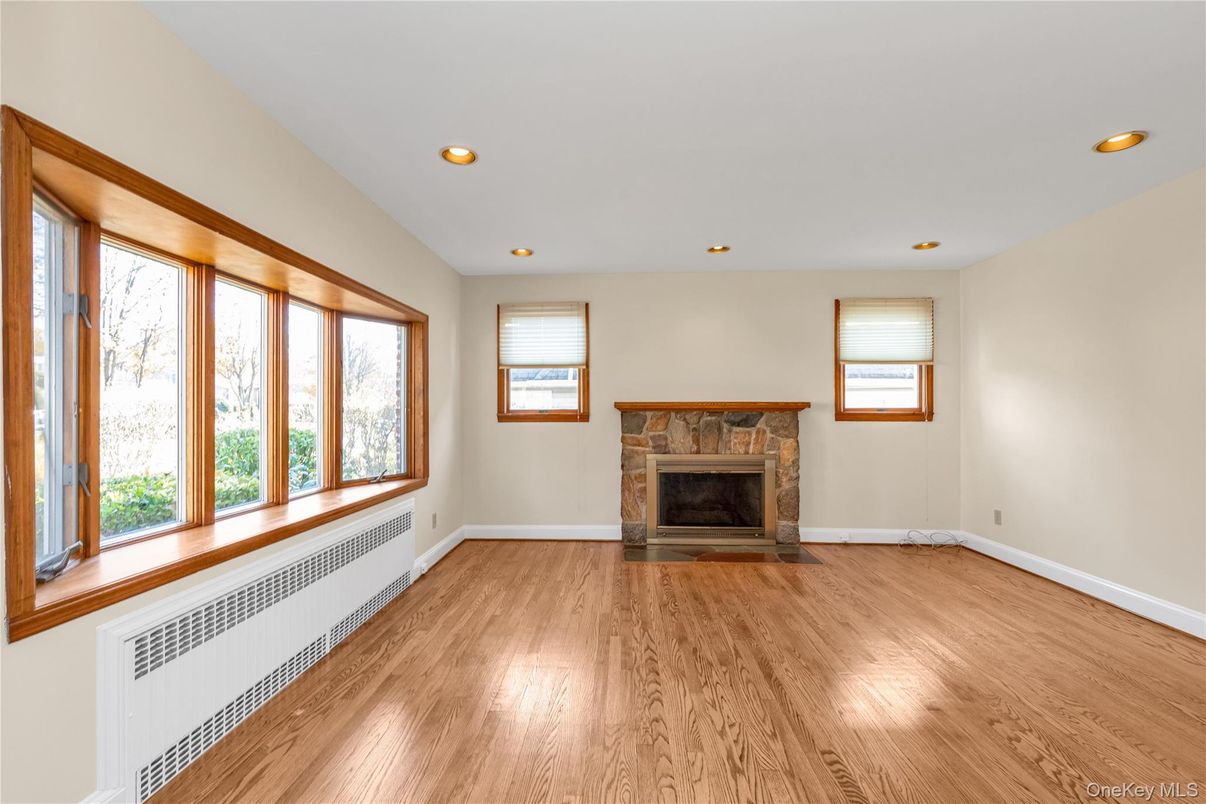Empty room, Fireplace, Interior, Recessed Lighting, Wood Texture Flooring