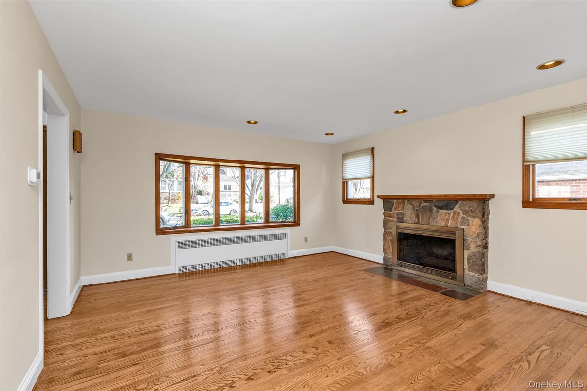 Empty room, Fireplace, Interior, Recessed Lighting, Wood Texture Flooring