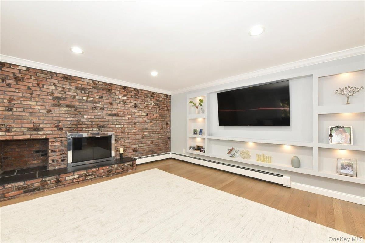 Fireplace, Interior, Recessed Lighting, Stone Walls, Wood Texture Flooring