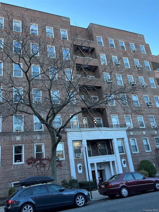 Exterior, Facade, Brick Facade, Condo Building