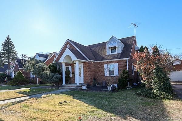 Exterior, Facade, Brick Facade, Cape Cod