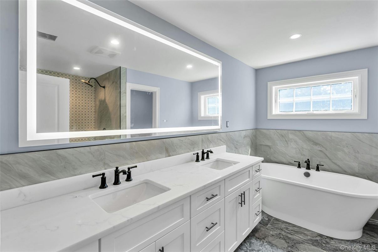 Bathroom, Dual Sink Vanities, Free Standing Baths, Interior, Marble, Marble Walls, Recessed Lighting