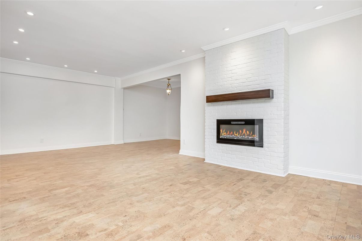 Empty room, Fireplace, Interior, Recessed Lighting, Wood Texture Flooring