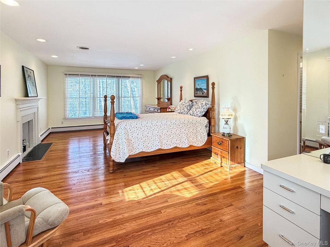 Bedroom, Fireplace, Interior, Recessed Lighting, Wood Texture Flooring