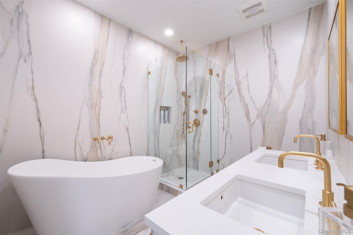 Bathroom, Free Standing Baths, Glass Shower, Interior, Marble Walls, Recessed Lighting