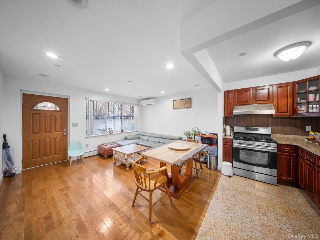 Dining room, Interior, Kitchen, Living room, Recessed Lighting, Stainless Steel Appliances, Wood Texture Flooring