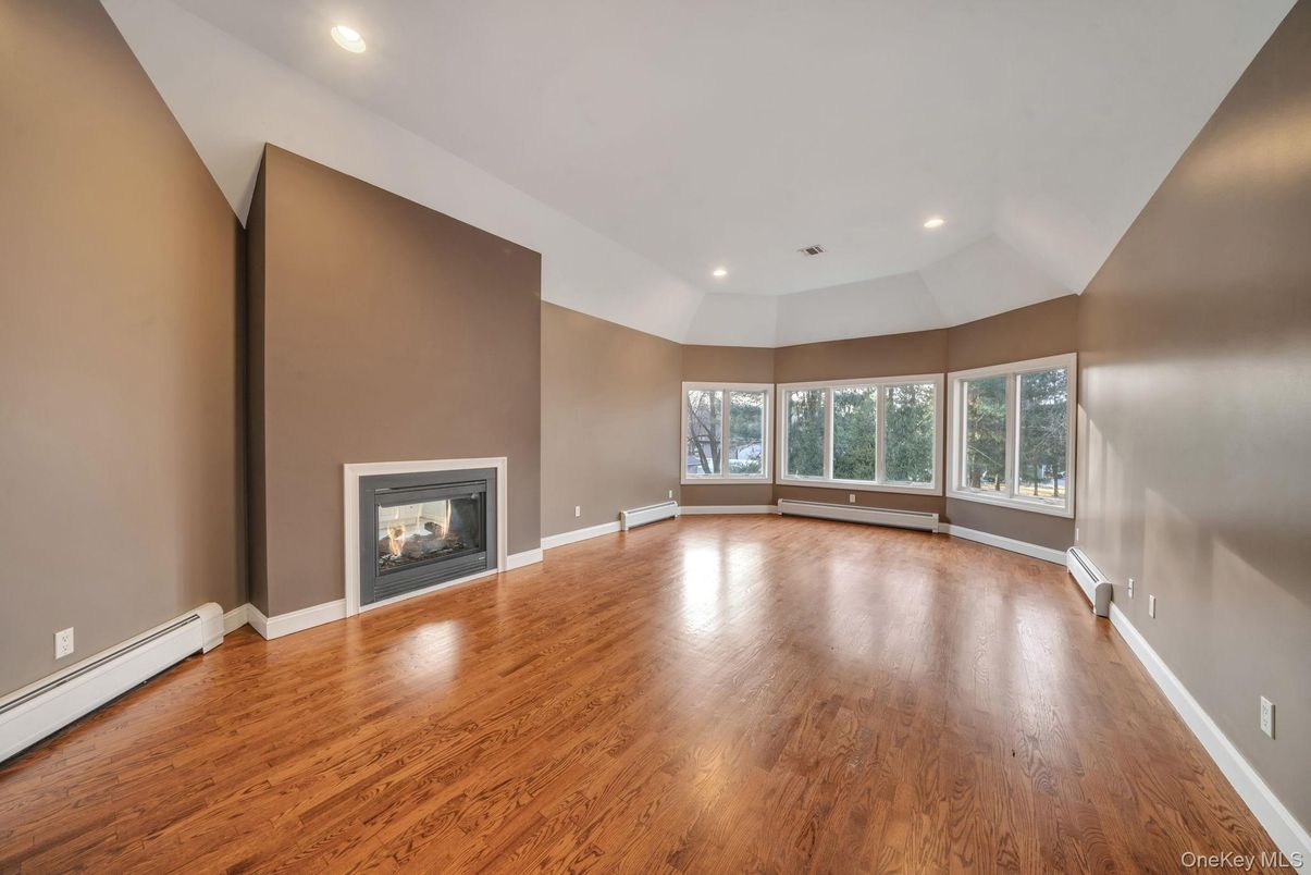 Empty room, Fireplace, Interior, Recessed Lighting, Wood Texture Flooring
