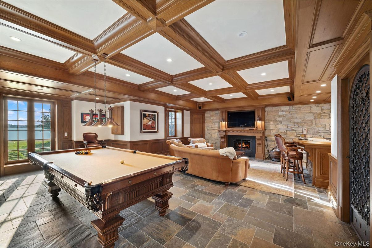 Billiard Table, Fireplace, Game Room, Interior, Living room, Pendant Lights, Recessed Lighting, Stone Walls, Wooden Beams