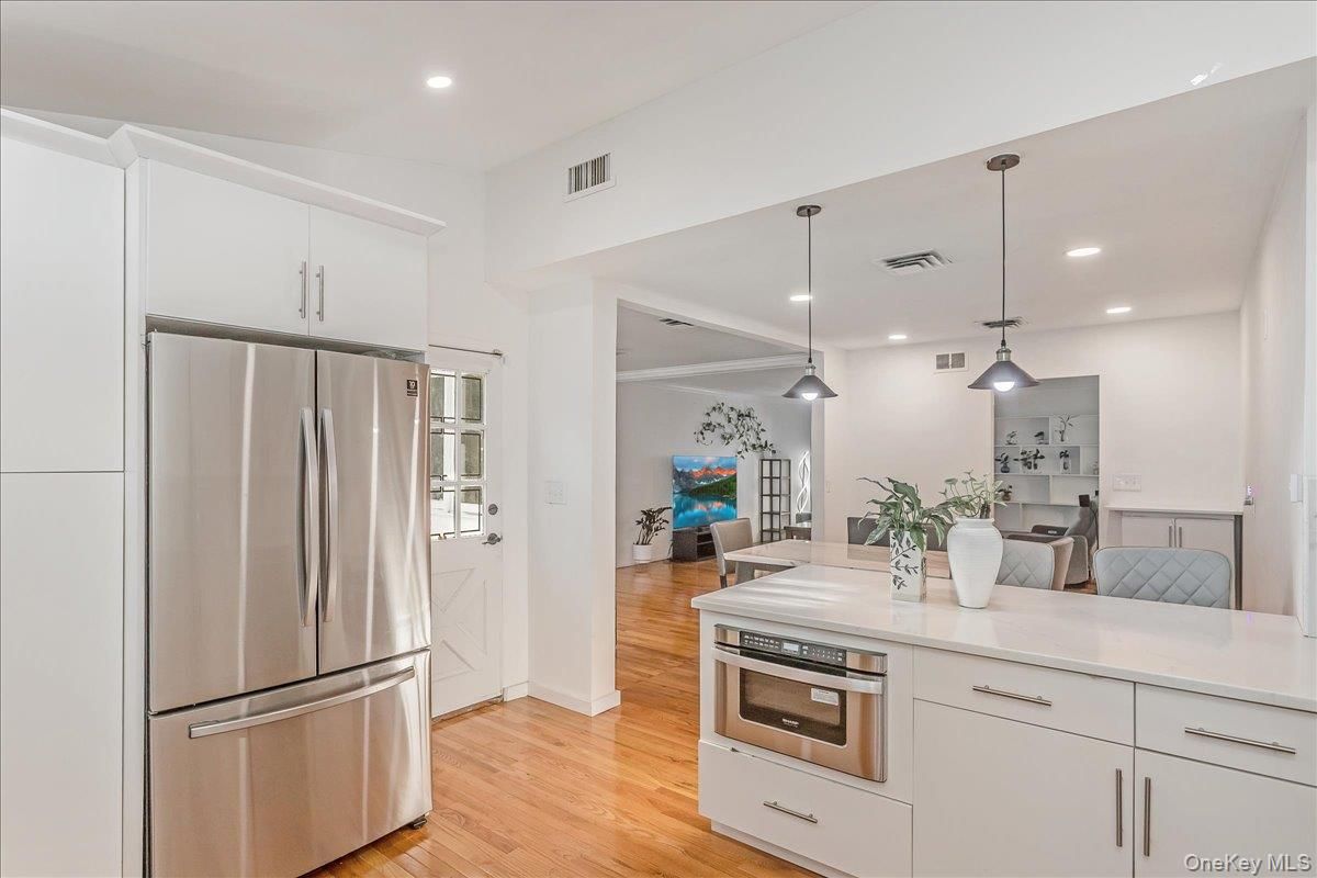 Interior, Kitchen, Pendant Lights, Recessed Lighting, Stainless Steel Appliances, Wood Texture Flooring