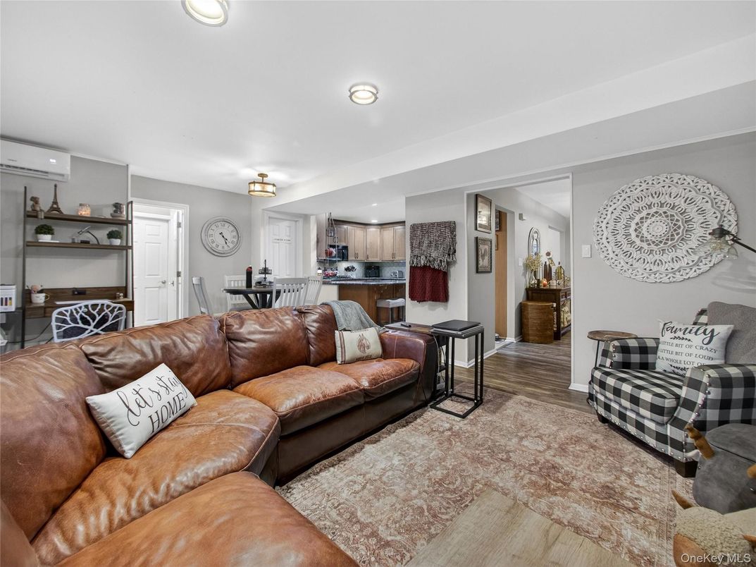 Dining room, Interior, Kitchen, Living room, Recessed Lighting, Stainless Steel Appliances, Wood Texture Flooring