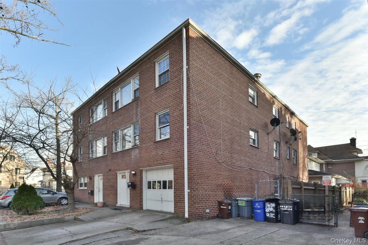 Attached, Exterior, Facade, Brick Facade, Condo Building