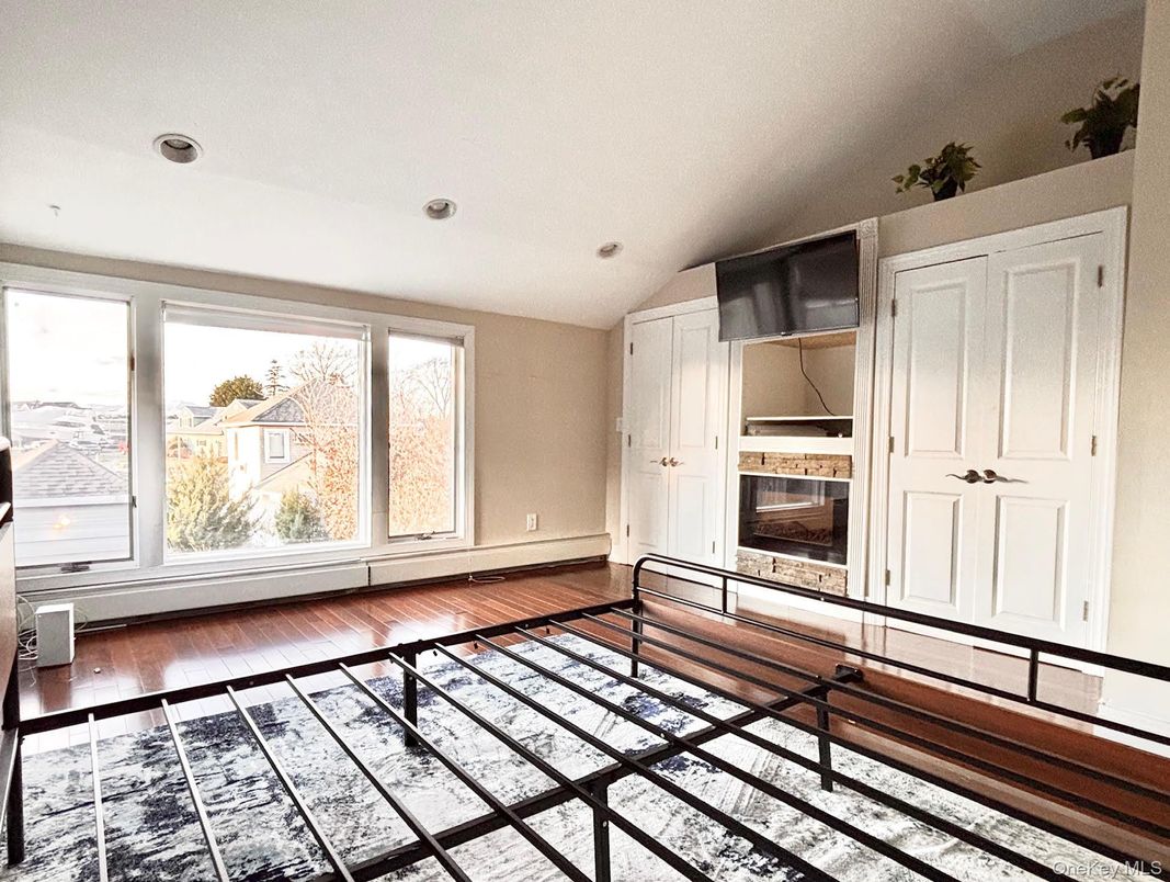 Empty room, Fireplace, Interior, Recessed Lighting, Wood Texture Flooring