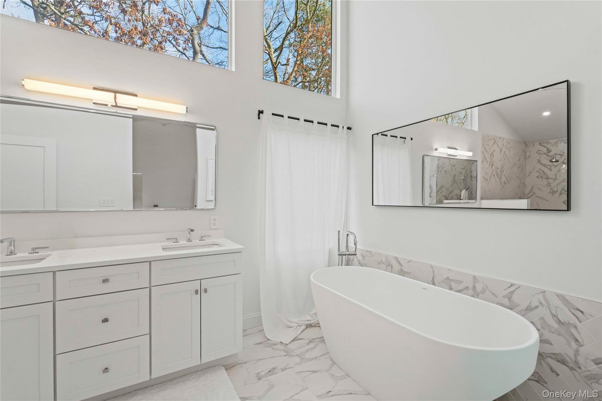 Bathroom, Dual Sink Vanities, Free Standing Baths, Interior, Marble, Marble Walls, Recessed Lighting