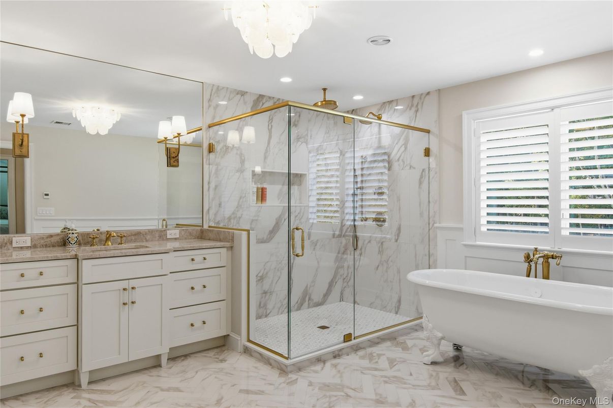 Bathroom, Free Standing Baths, Glass Shower, Interior, Marble, Marble Walls, Recessed Lighting