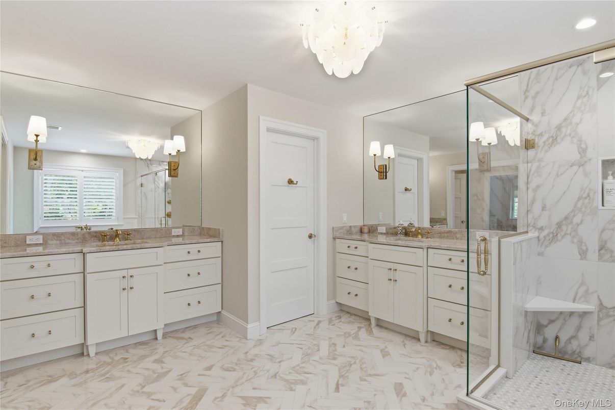 Bathroom, Chandelier, Dual Sink Vanities, Glass Shower, Interior, Marble, Marble Walls, Recessed Lighting