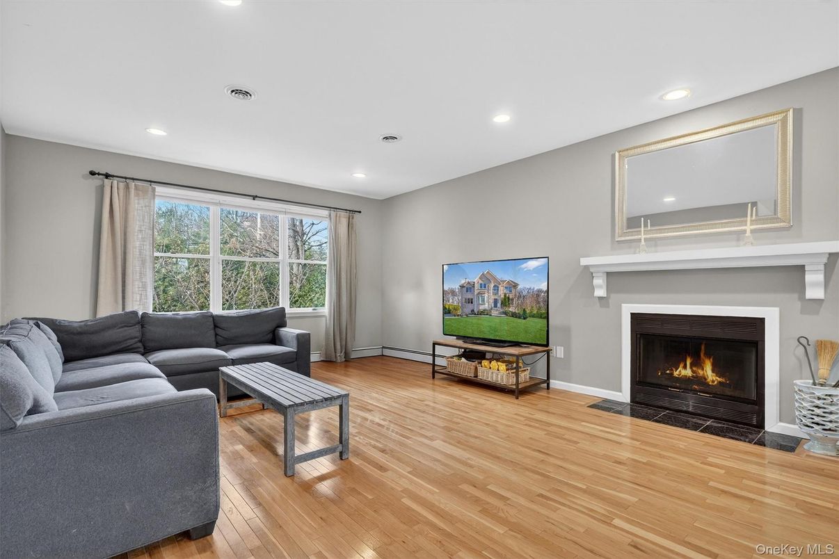 Fireplace, Interior, Living room, Recessed Lighting, Wood Texture Flooring