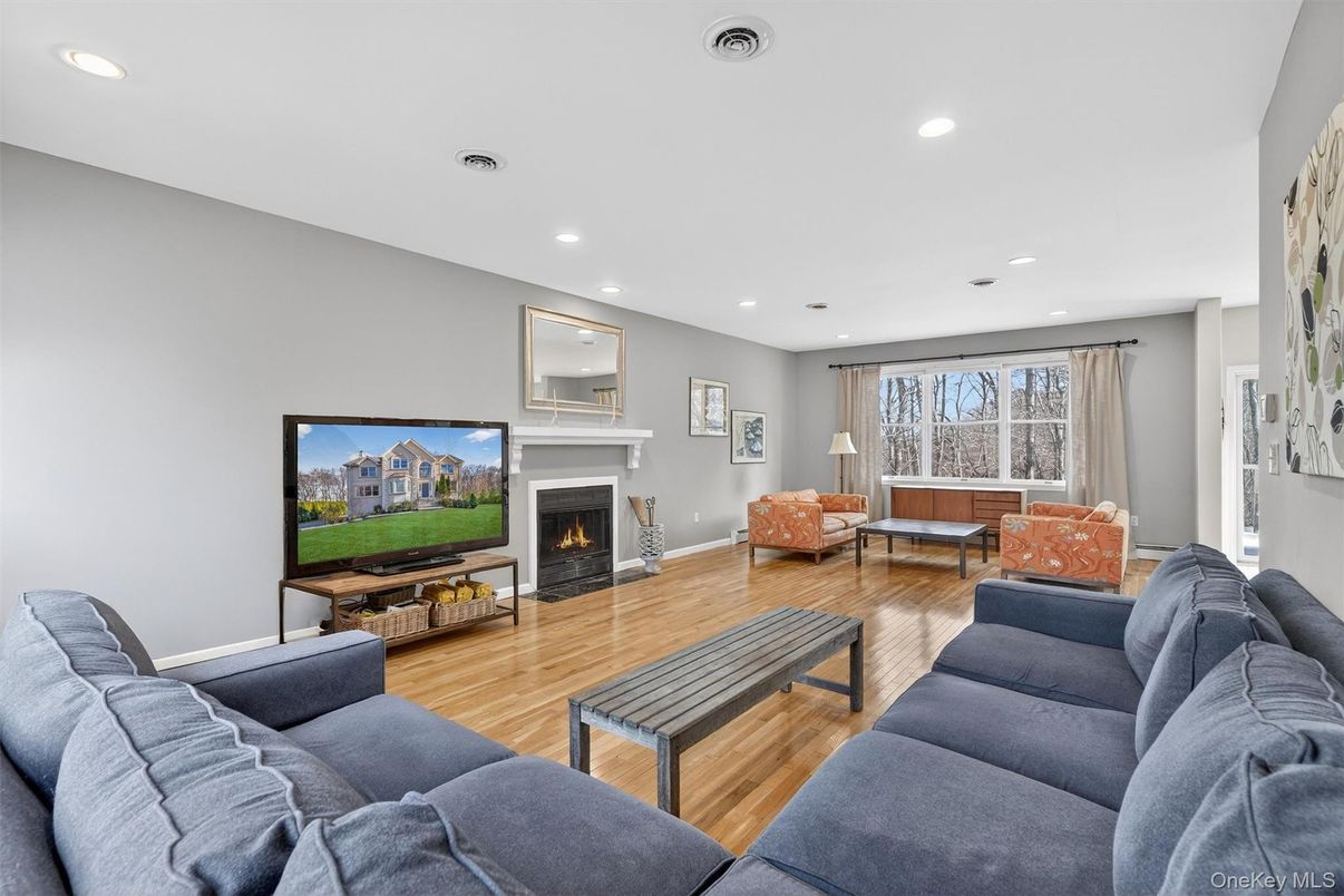 Fireplace, Interior, Living room, Recessed Lighting, Wood Texture Flooring