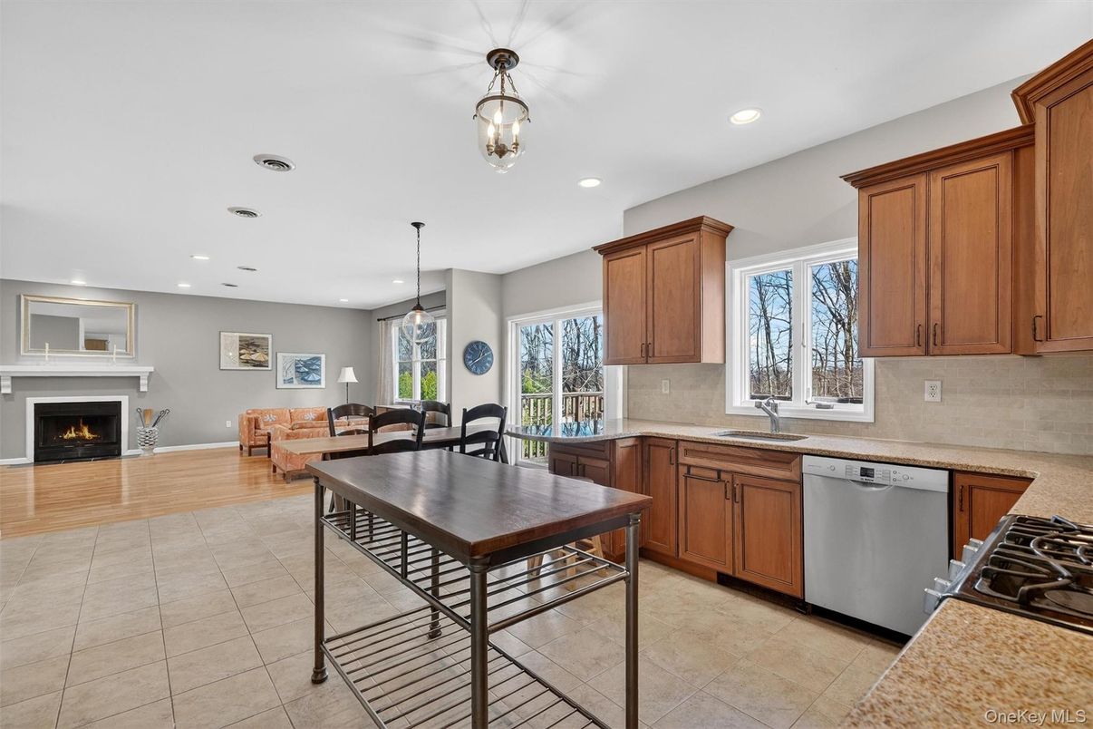 Dining room, Fireplace, Interior, Kitchen, Living room, Pendant Lights, Recessed Lighting, Stainless Steel Appliances