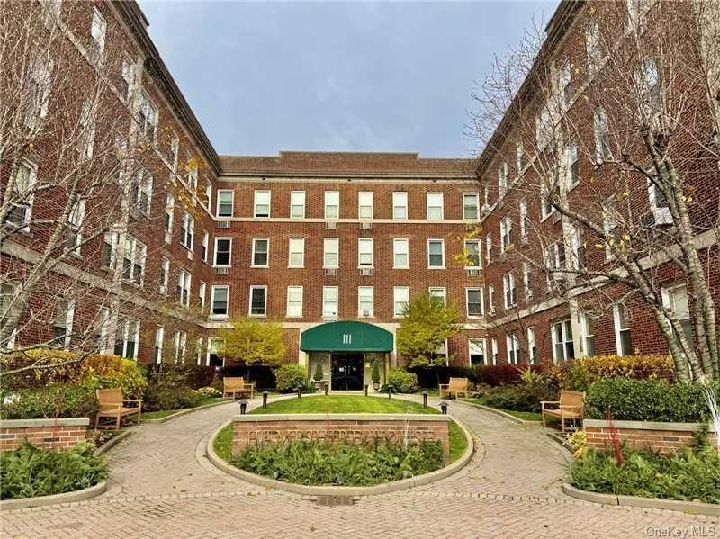 Exterior, Facade, Brick Facade, Condo Building