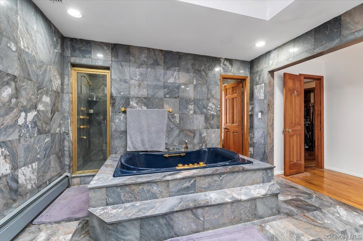 Bathroom, Glass Shower, Interior, Marble Walls, Recessed Lighting, Wood Texture Flooring