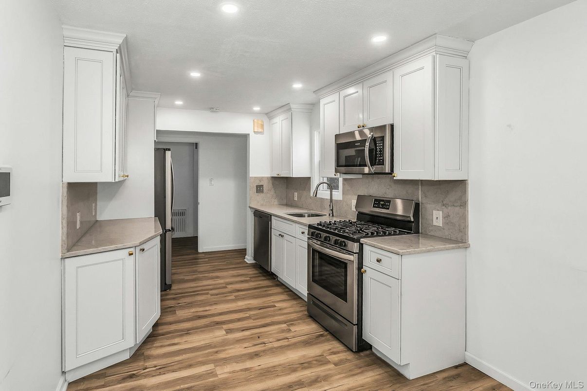 Interior, Kitchen, Recessed Lighting, Stainless Steel Appliances, Wood Texture Flooring