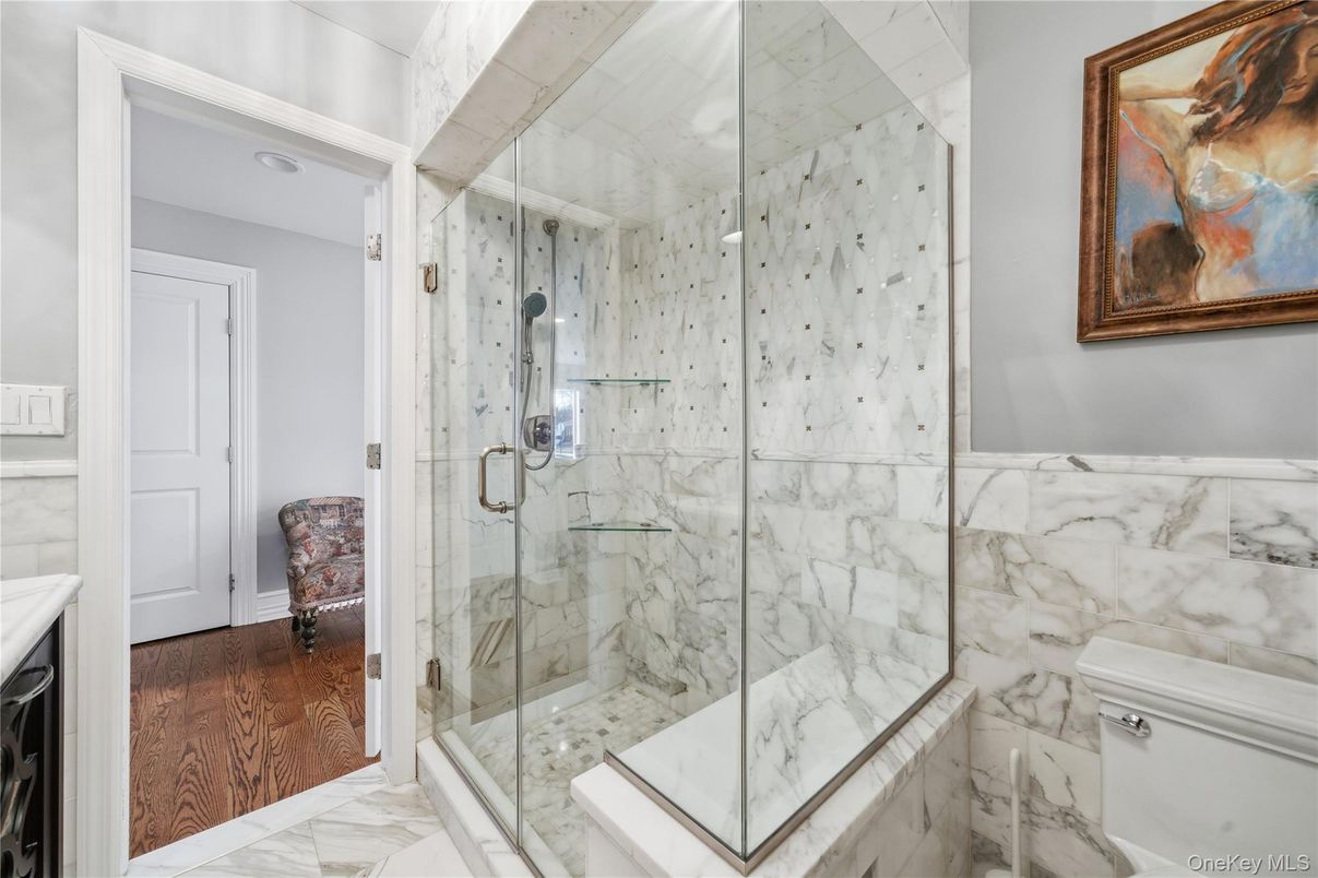 Bathroom, Glass Shower, Interior, Marble, Marble Walls, Recessed Lighting, Wood Texture Flooring